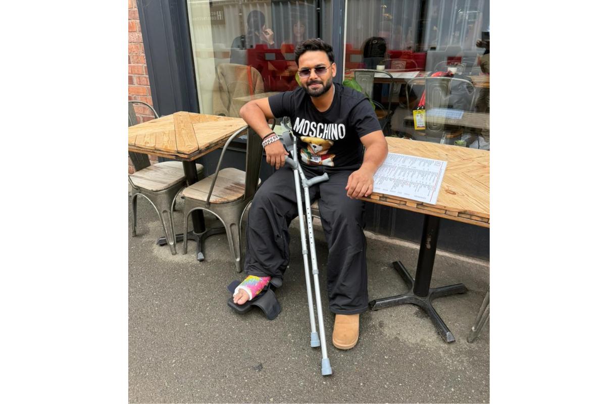 Rishabh Pant with his foot in a cast after picking up an injury on the opening day of the 4th Test at Old Trafford in July