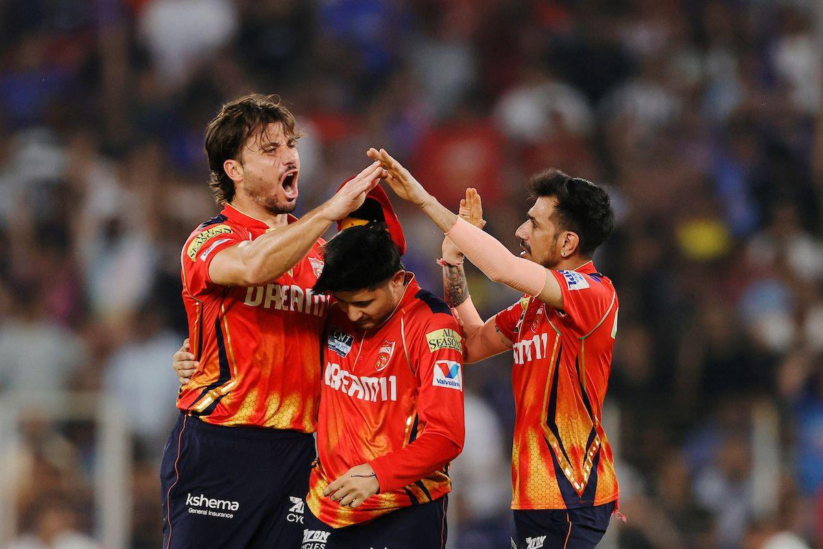 Marcus Stoinis celebrates the wicket of Rohit Sharma 