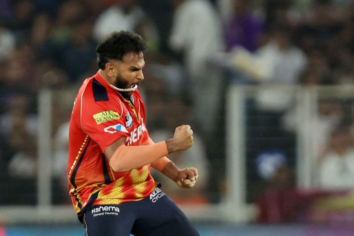 Punjab Kings' Vijaykumar Vyshak celebrates after the wicket of Mumbai Indians' Jonny Bairstow
