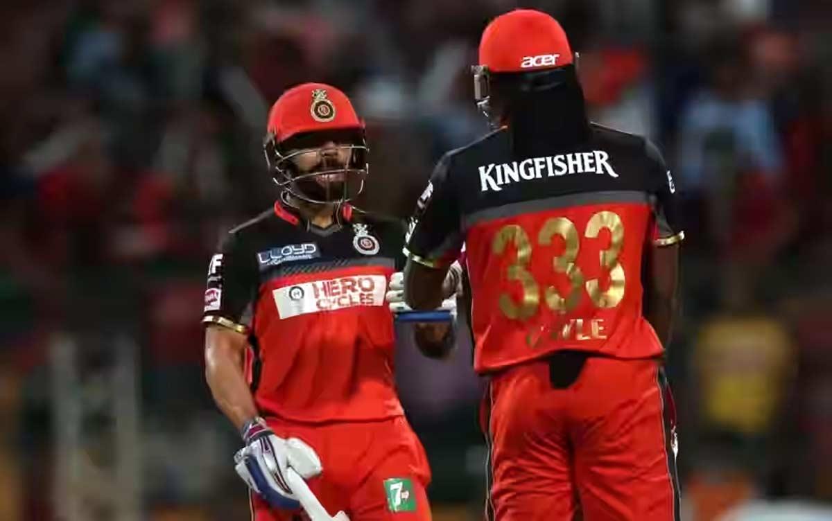 Virat Kohli with Chris Gayle