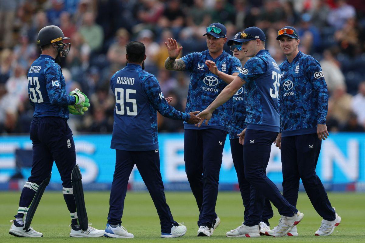 England's Adil Rashid celebrates with teammates after taking the wicket of West Indies' Brandon King,
