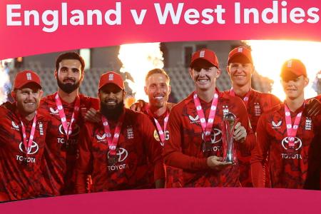 England's Harry Brook lifts the trophy as he celebrates with teammates after winning the 3rd T20I and sweep the series at Utilita Bowl, Rose Bowl in Southampton, on Tuesday