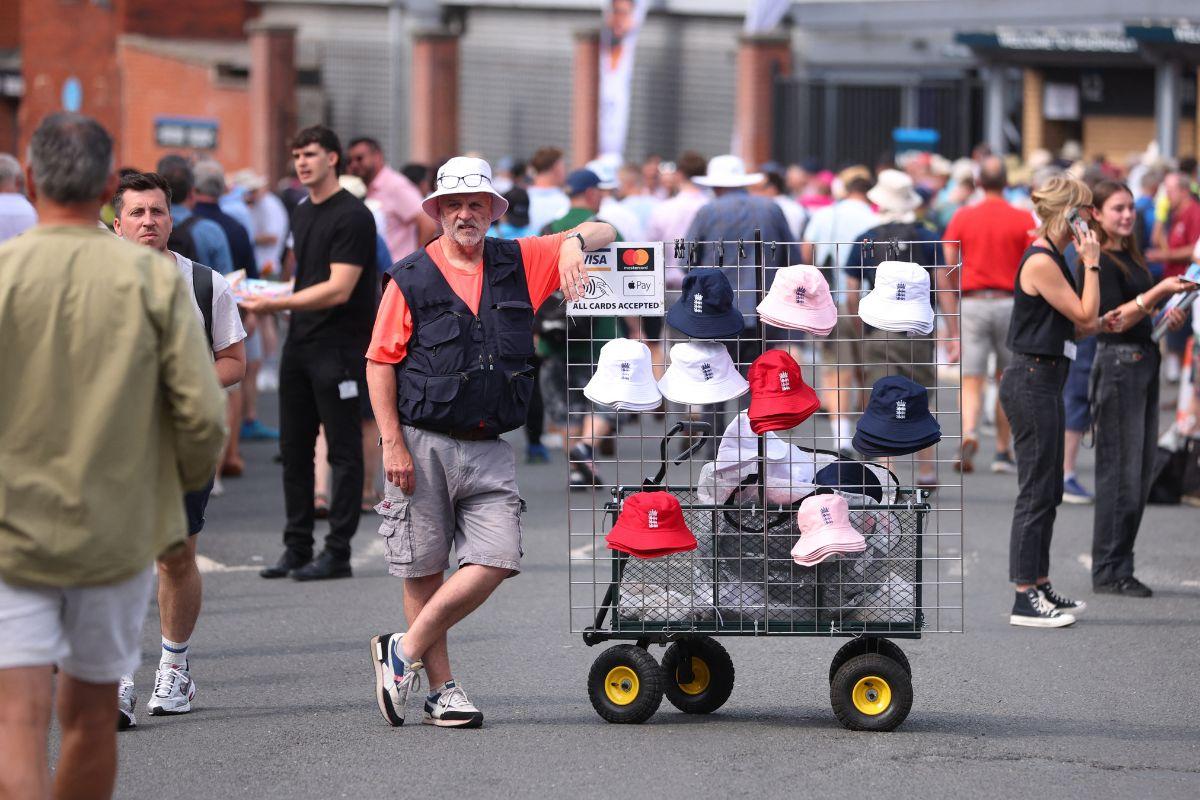 General view of a hat stall outside the stadium before the match 