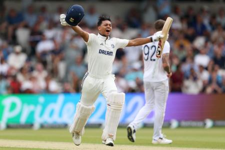India's Yashasvi Jaiswal celebrates after reaching his century