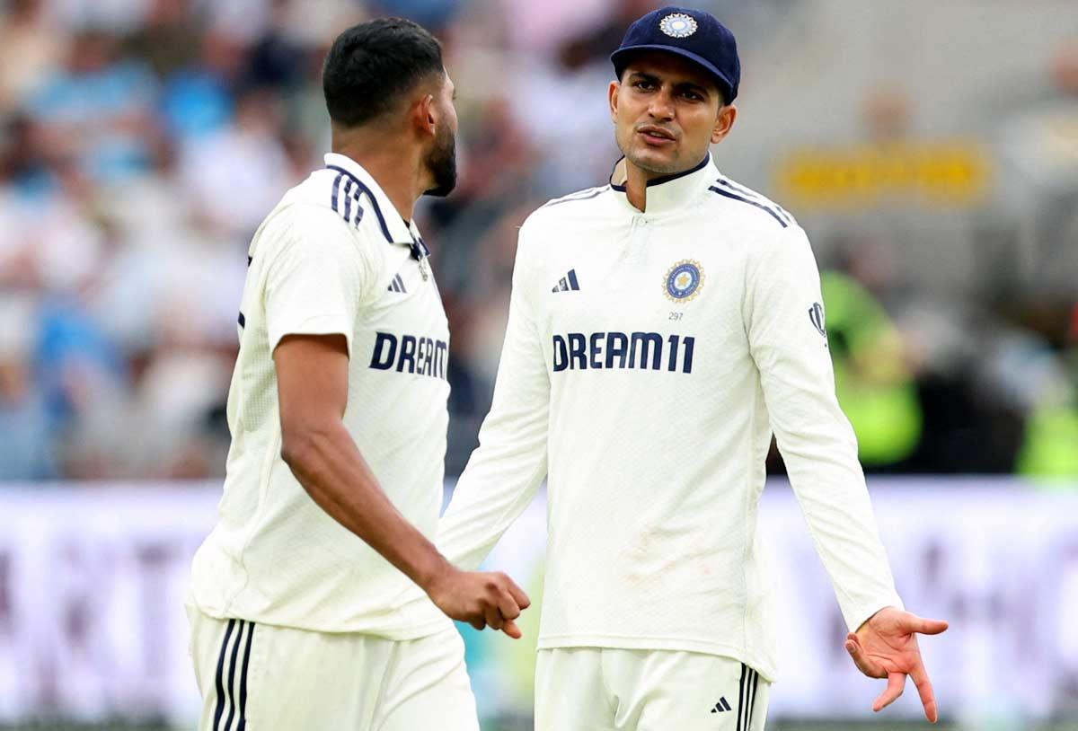 India captain Shubman Gill speaks to Mohammed Siraj.
