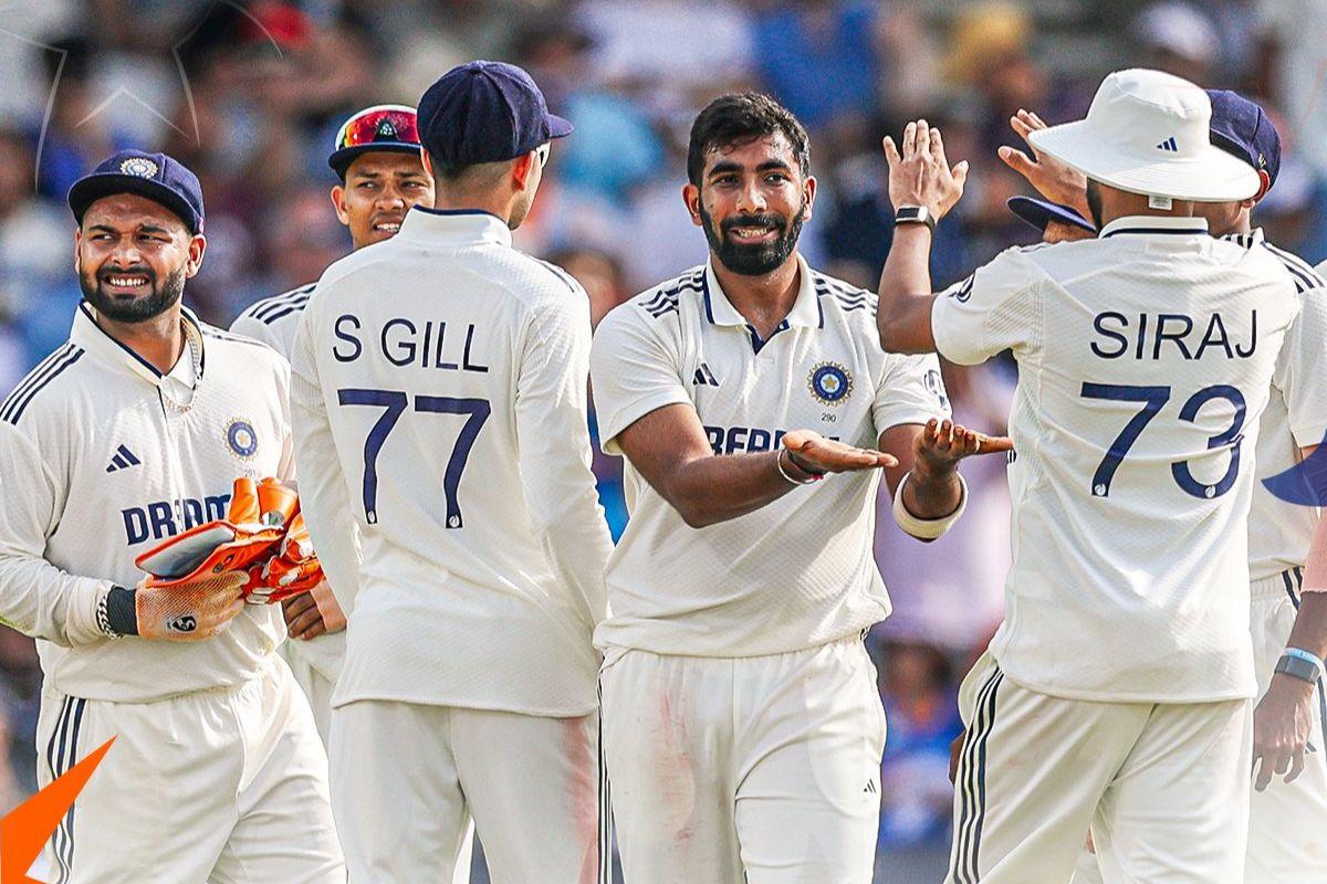 Jasprit Bumrah celebrates with teammates after dismissing Joe Root