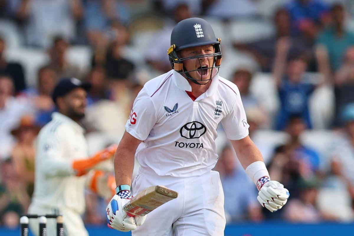 England's Ollie Pope celebrates after reaching his century 