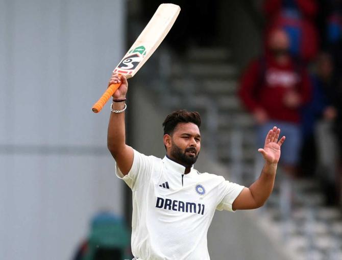 Rishabh Pant celebrates his century.