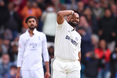 Rishabh Pant celebrates his century, his 2nd of the match, on Day 4 of the 1st Test at Headingley in Leeds on Monday