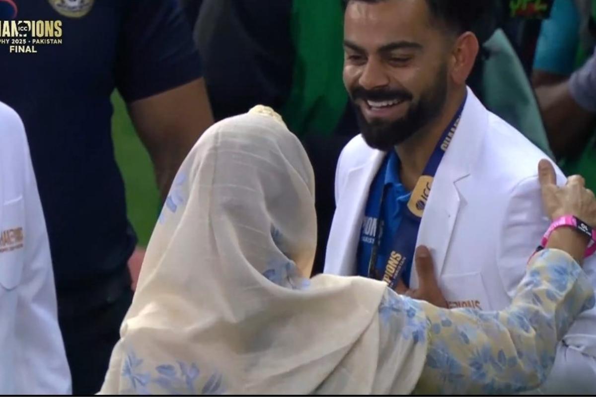 Virat Kohli takes Mohammed Shami's mother Anjum Ara's blessings after the Champions Trophy win in Dubai on Sunday