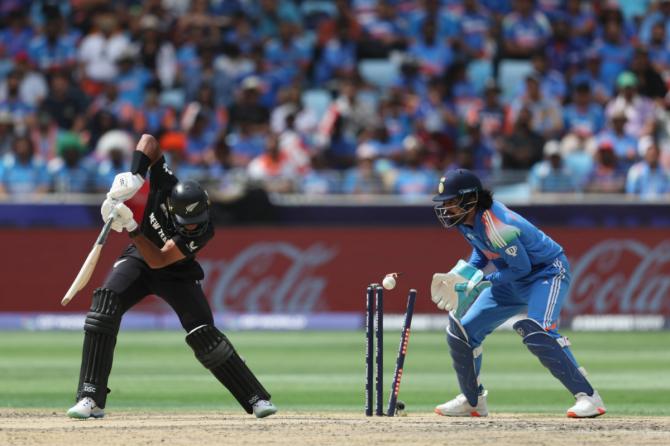 Rachin Ravindra is bowled out by Kuldeep Yadav in the 11th over 