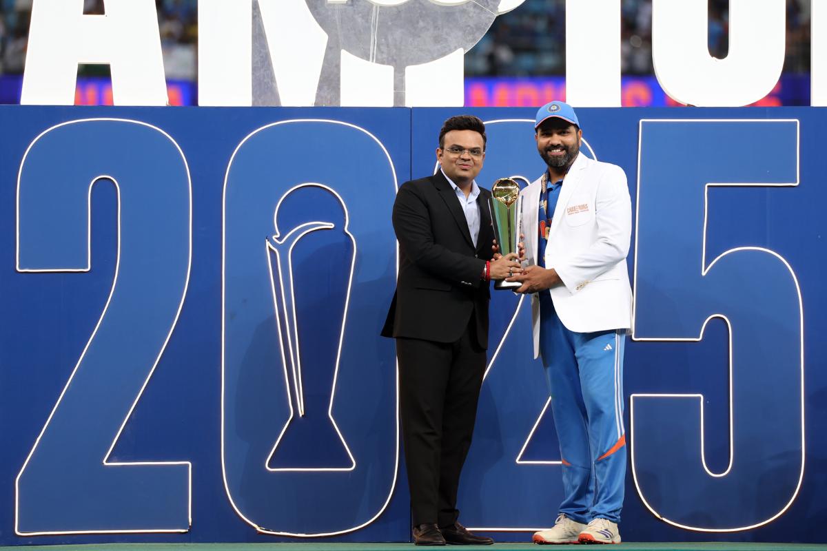 ICC President Jay Shah presents the trophy to Rohit Sharma after India won the Champions Trophy in Dubai on Sunday