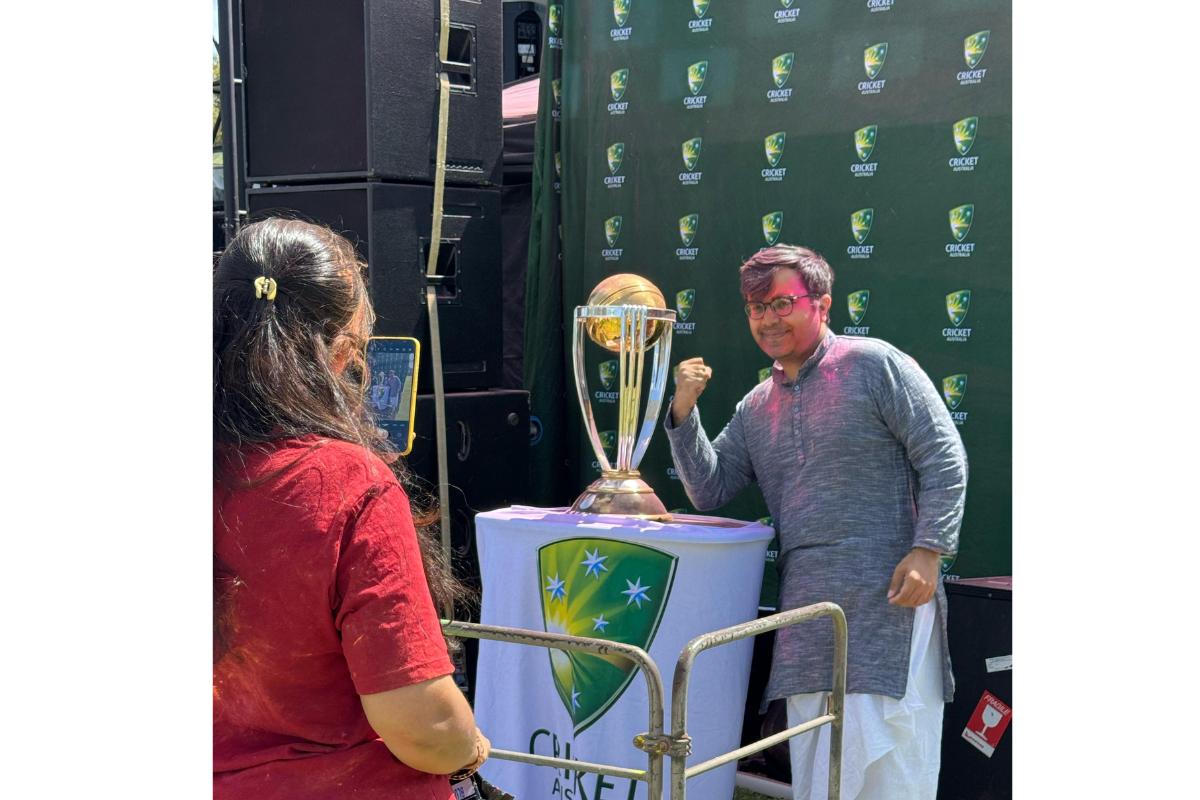 An Indian fan with the ICC ODI World Cup at a Holi celebration organised by Cricket Australia in Melbourne