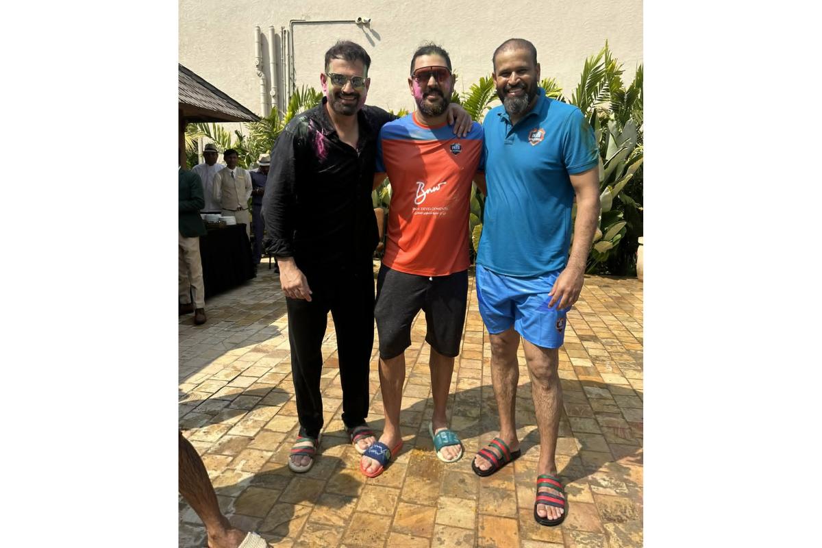 Yuvraj Singh is flanked by the Pathan brothers, Irfan and Yusuf