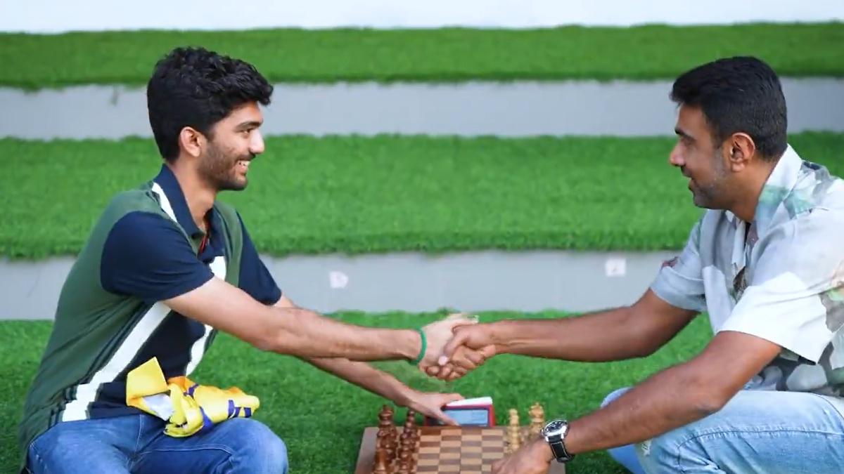 Ravichandran Ashwin with D Gukesh