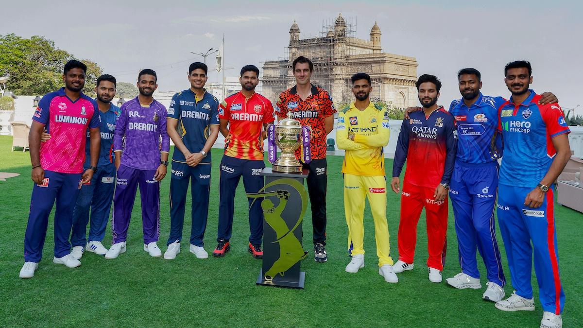 Team captains pose for a photograph prior to the start of Indian Premier League 2025 in Mumbai.