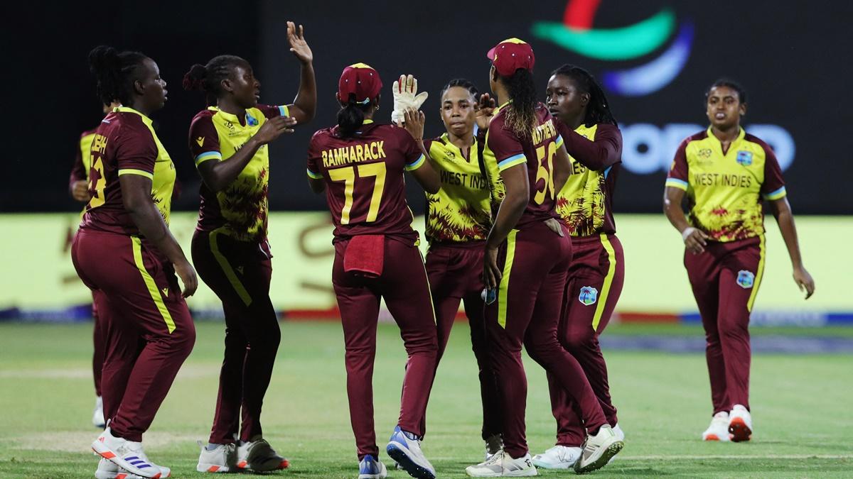 West Indies' Karishma Ramharack celebrates with teammates after taking a catch to dismiss New Zealand's Amelia Kerr off the bowling of Deandra Dottin - 2023 T20 World Cup