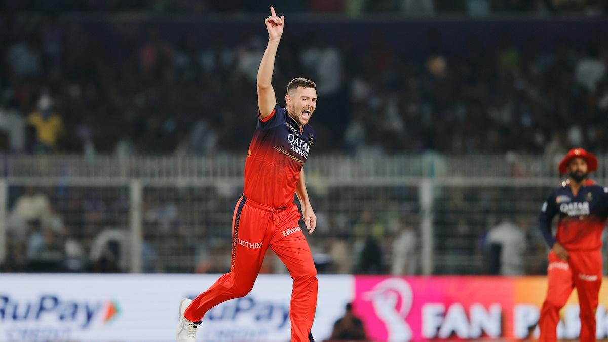 Royal Challengers Bengaluru pacer Josh Hazlewood celebrates dismissing Kolkata Knight Riders opener Quinton De Kock early in the Indian Premier League opener at the Eden Gardens in Kolkata on Saturday.