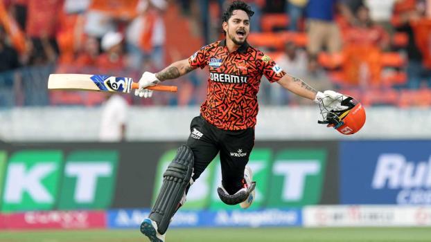Ishan Kishan celebrates after completing his century.
