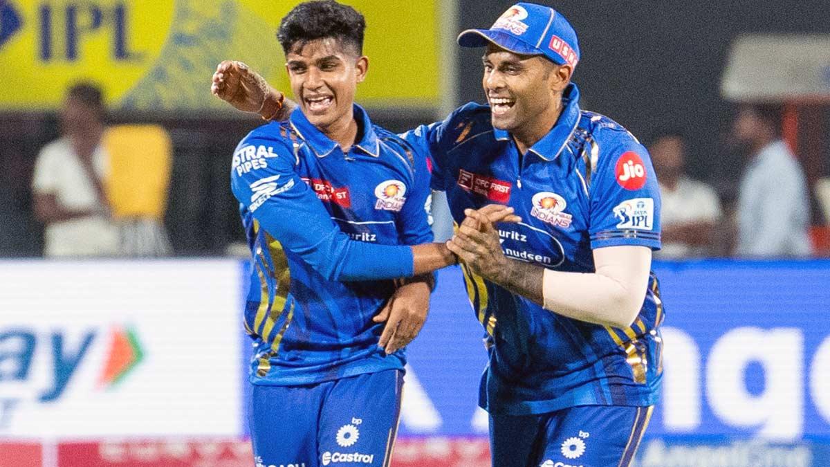 Vignesh Puthu celebrates a wicket with MI captain Suryakumar Yadav