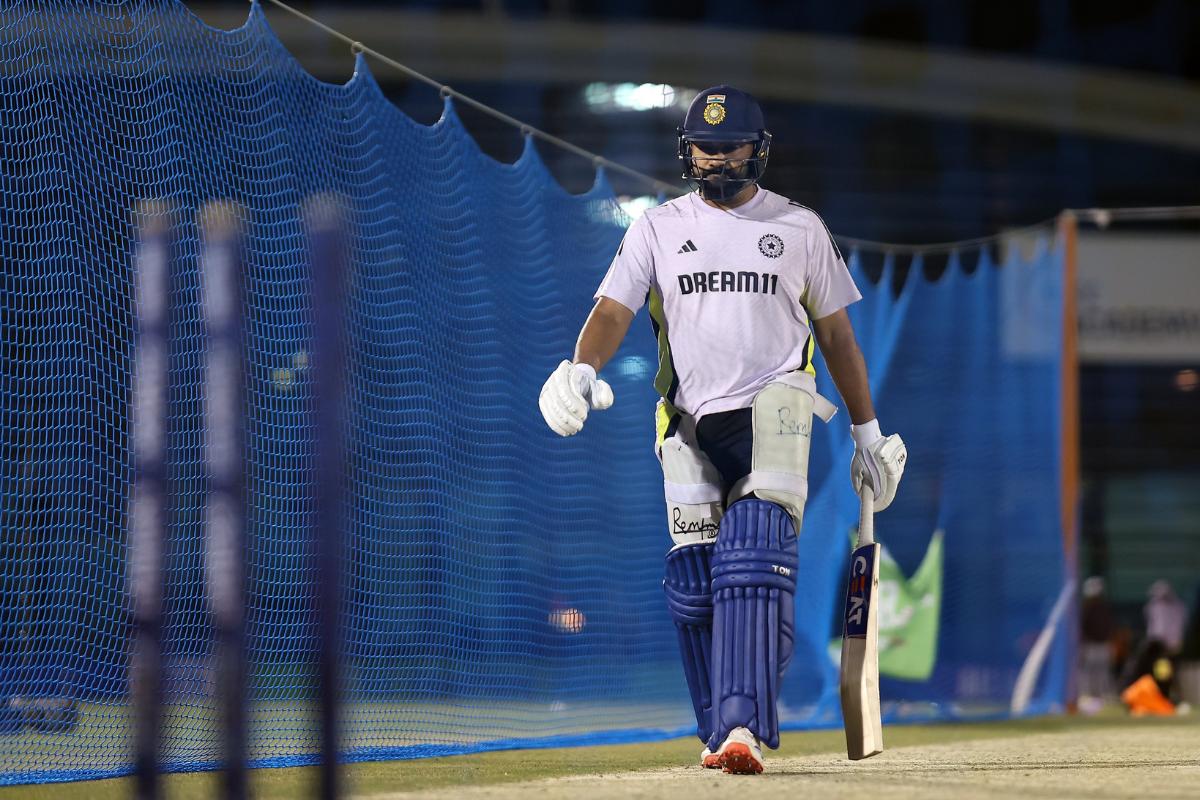 Rohit Sharma walks out to bat in the nets 