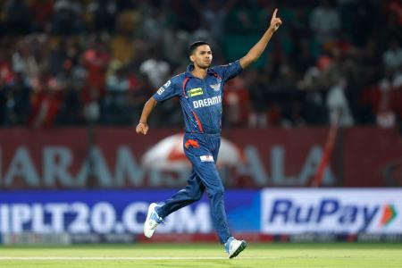 Akash Singh celebrates the wicket of Priyansh Arya