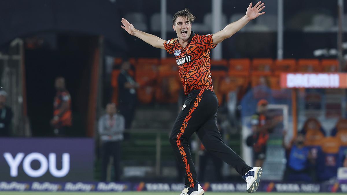 Pat Cummins celebrates the wicket of Karun Nair