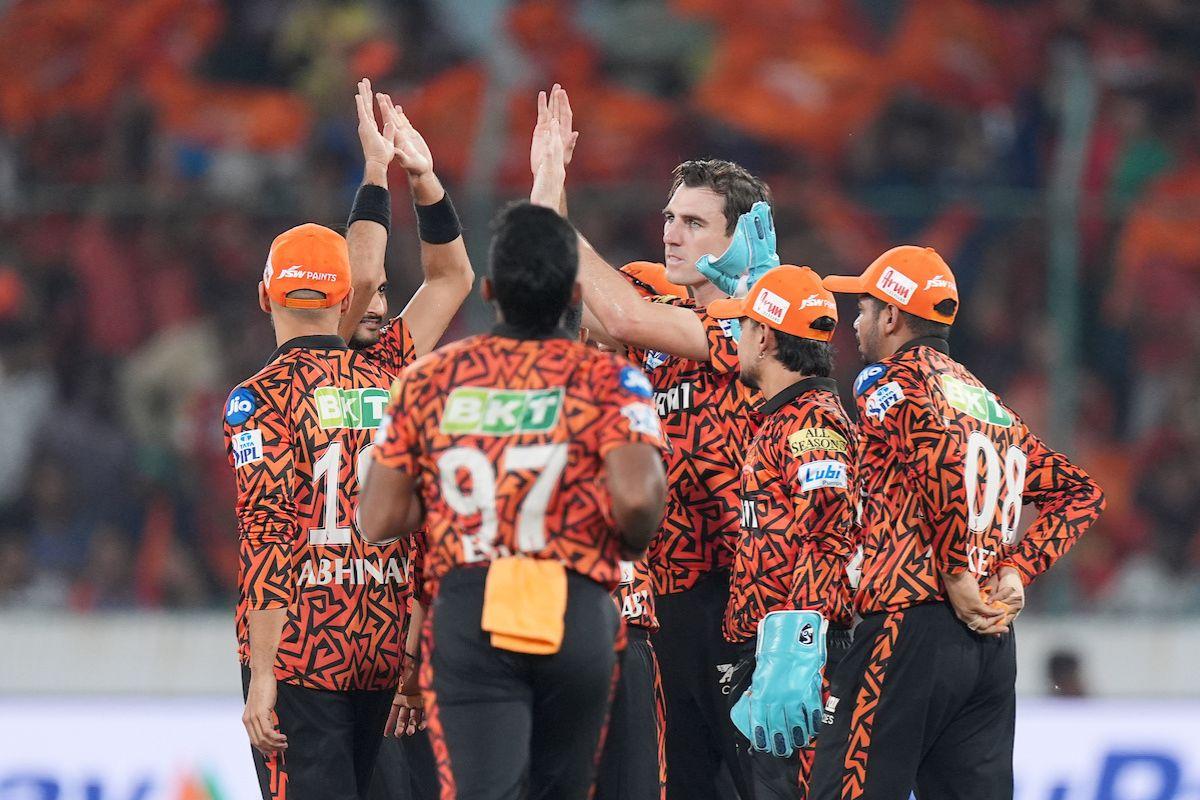 Pat Cummins celebrates with teammatas after dismissing Faf du Plessis