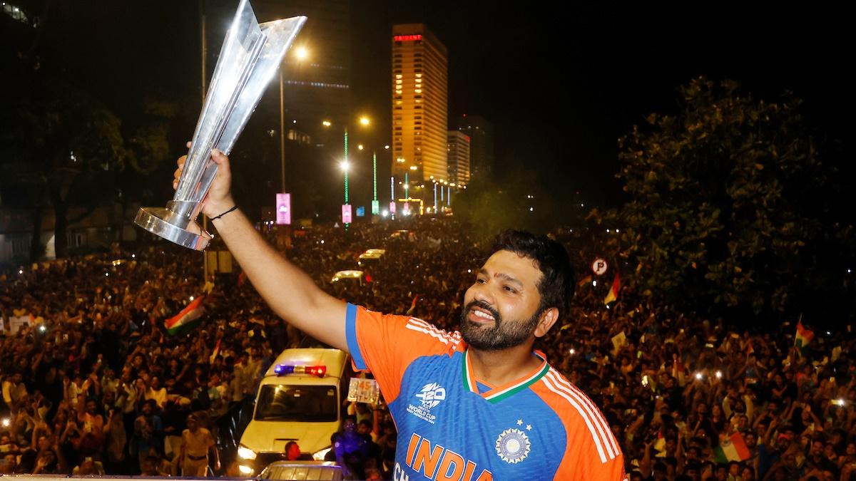 Rohit Sharma with the T20 World Cup trophy during the victory parade in Mumbai on July 4, 2024.