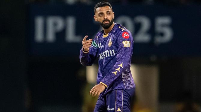 Kolkata Knight Riders spinner Varun Chakaravarthy gestures towards Chennai Super Kings batter Dewald Brewis after dismissing him for 52 during the IPL match in Kolkata on Wednesday.