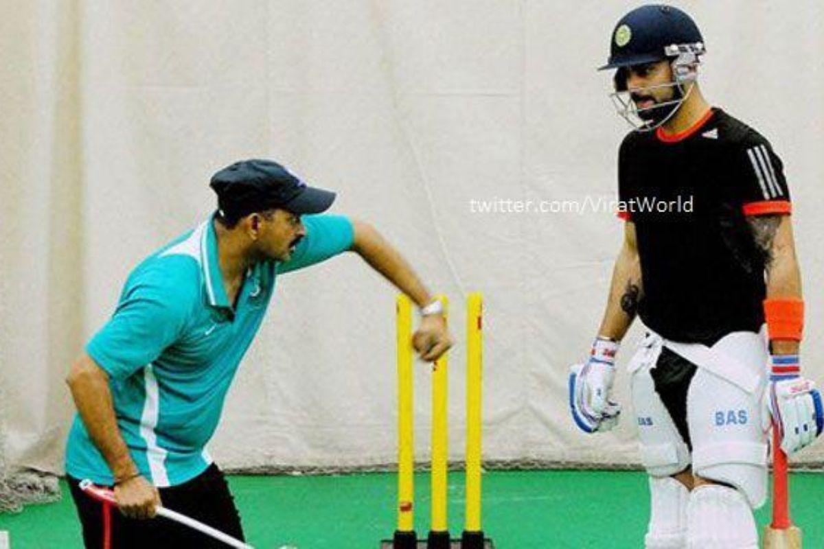 Lalchand Rajput giving batting lessons to Virat Kohli at the MCA, in October 2014