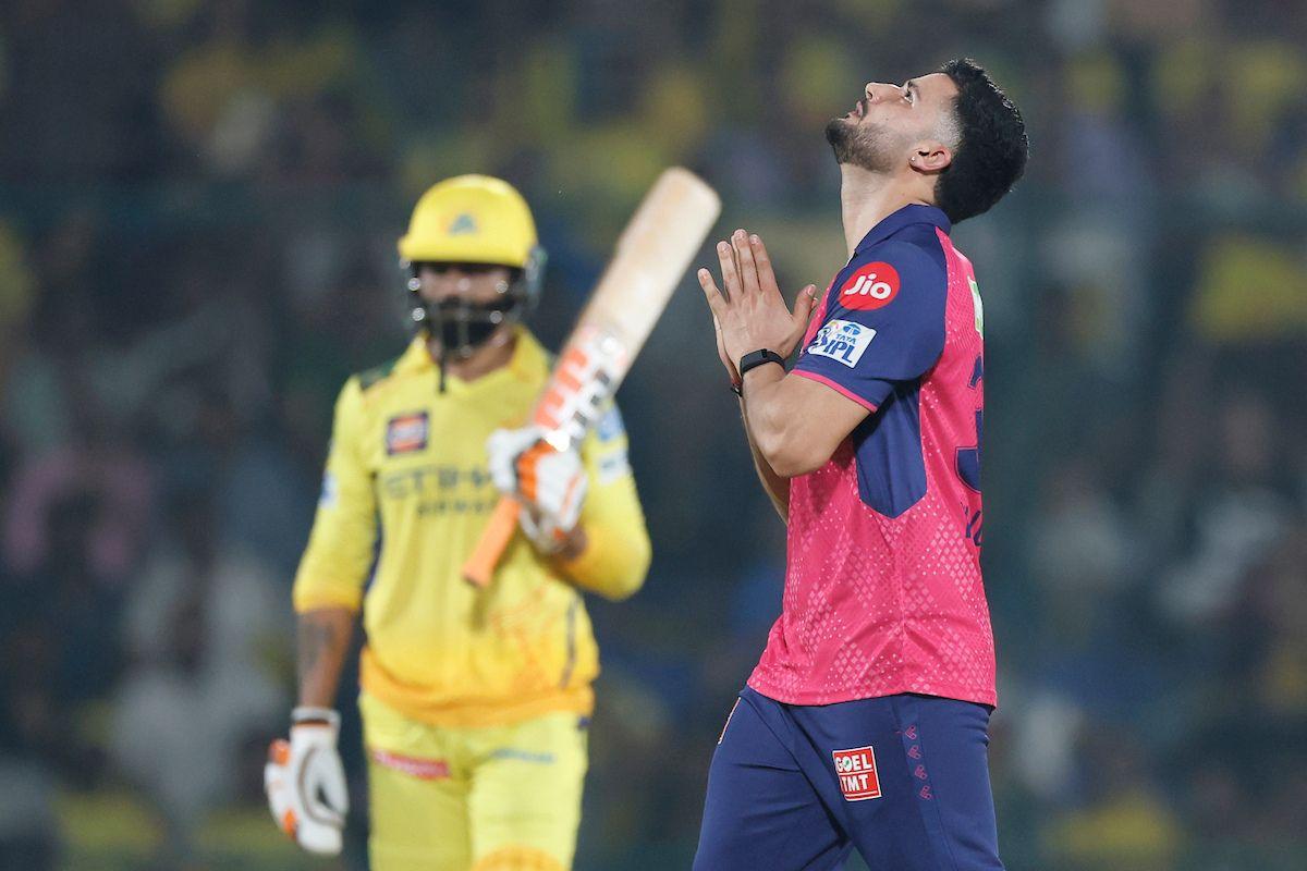 Yudhvir Singh Charak celebrates the wicket of Ravindra Jadeja.