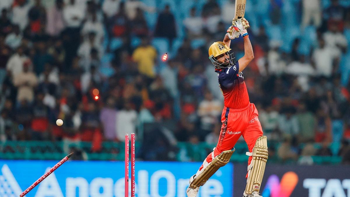 Bhuvneshwar Kumar is bowled by Pat Cummins