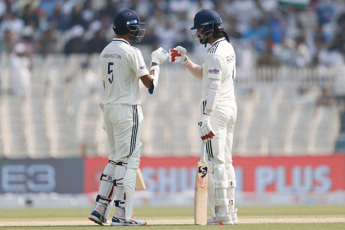 Washington Sundar and K L Rahul celebrate their 50-run stand.
