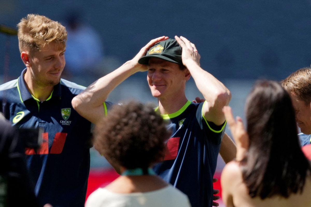 Debutant Australia's Brendan Doggett receives his first cap before the start of play on day one 