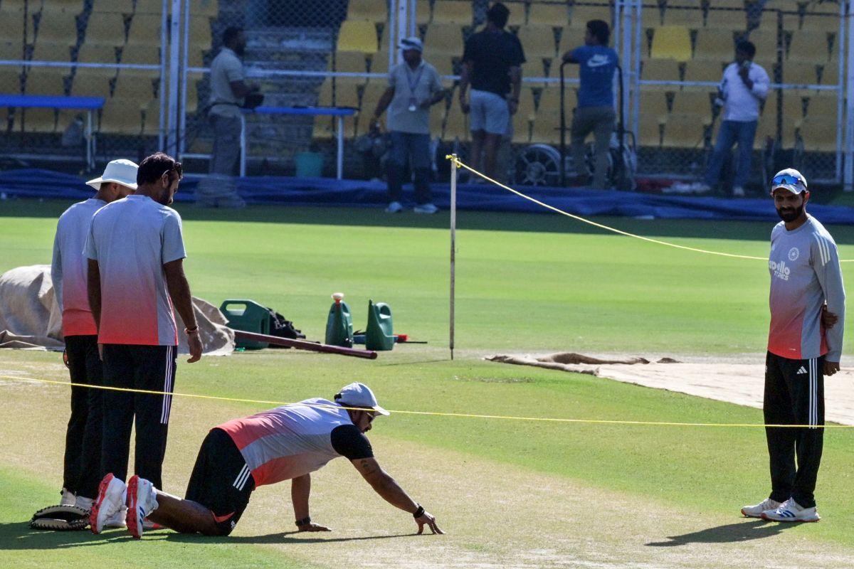  Indian Cricket team player Ravindra Jadeja and others assess pitch