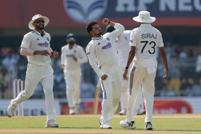 Kuldeep Yadav celebrates the wicket of Ryan Rickelton