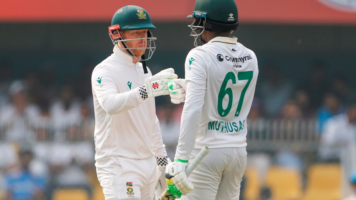 Senuran Muthusamy is congratulated by Kyle Verreynne after getting to 50.