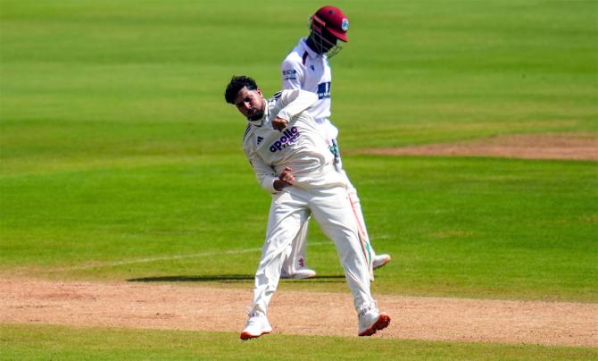 Kuldeep Yadav celebrates after dismissing Roston Chase