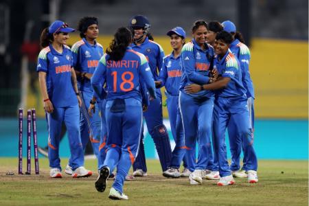 Indian pacer Kranti Goud celebrates with teammates on taking a wicket against Pakistan during their ICC Women's World Cup match in Colombo on Sunday