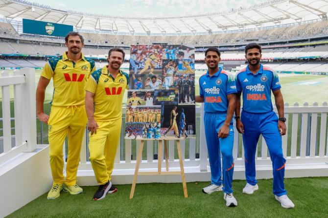 Australia's Mitchell Starc, Travis Head with India's Dhruv Jurel and Nitish Kumar Reddy during a media photo-op at the Optus Stadium in Perth on Friday
