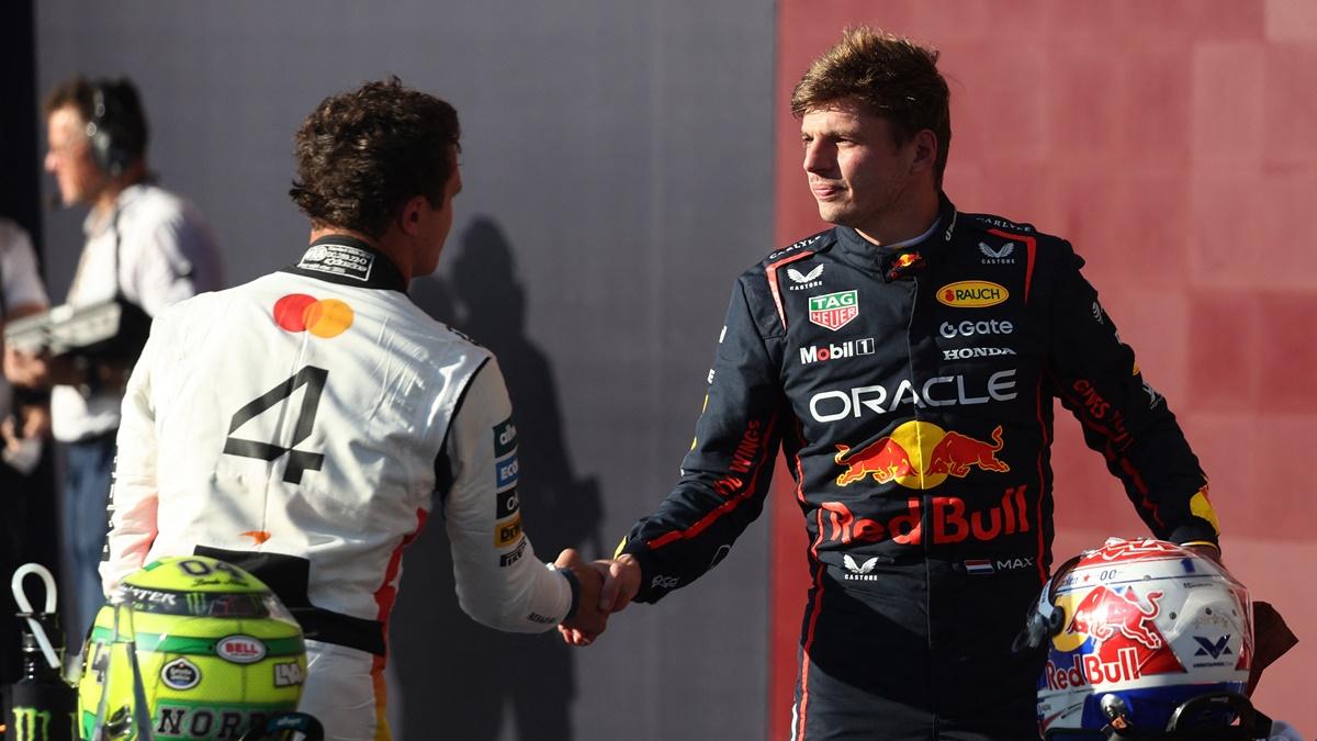 Red Bull's Max Verstappen celebrates with second placed McLaren's Lando Norris after qualifying in pole position for the United States Grand Prix, at Circuit of the Americas, Austin, Texas, on Saturday.