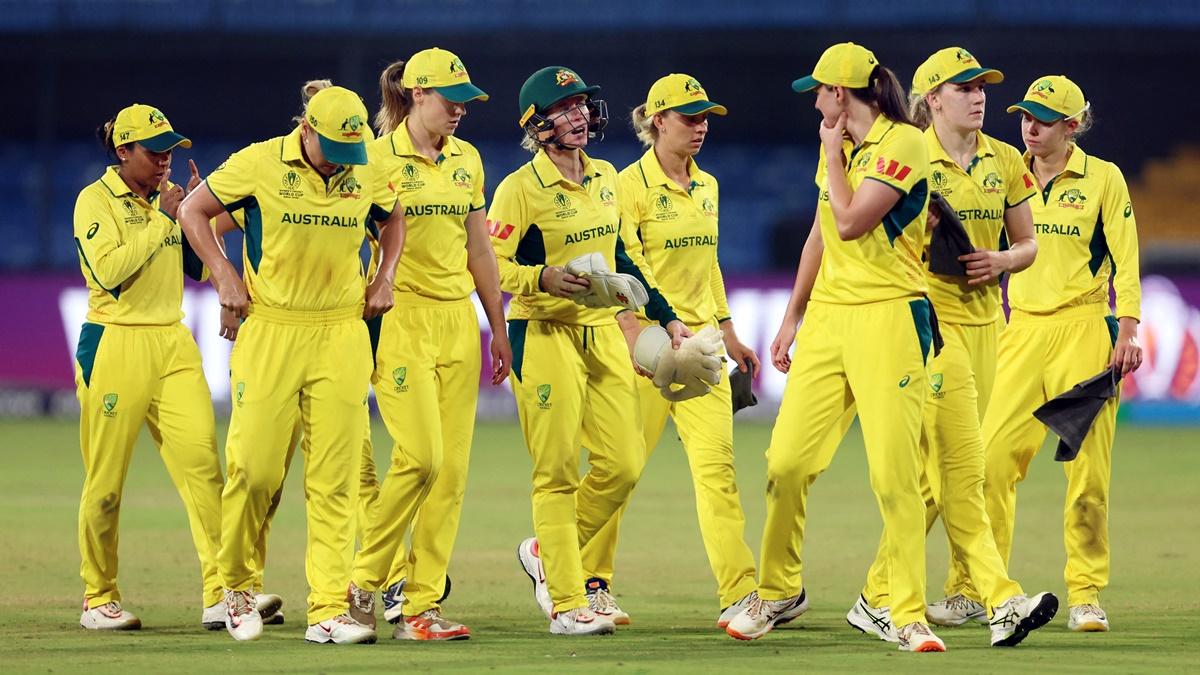 Australia's players walk back to the pavilion at the break during the women's World Cup match against England at Holkar Cricket Stadium, in Indore, October 22, 2025.
