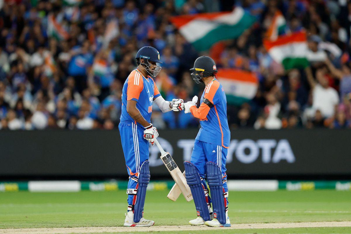 Harshit Rana and Abhishek Sharma of India celebrate their 50-run partnership