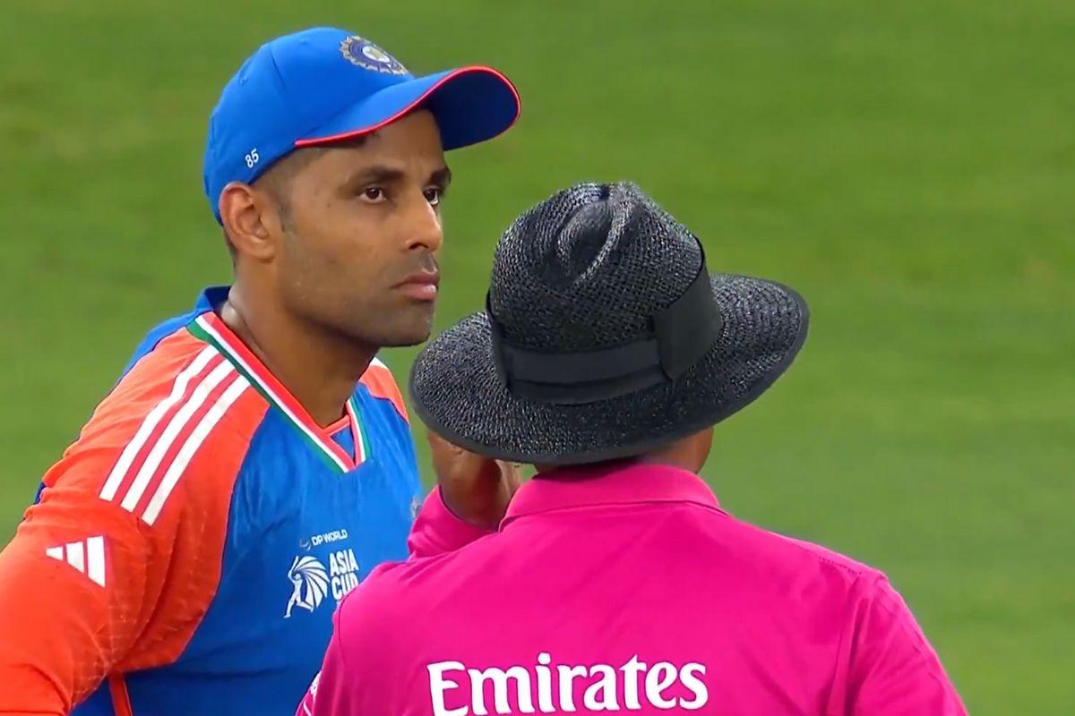 Indian captain Suryakumar Yadav talks to the umpire to withdraw the run out