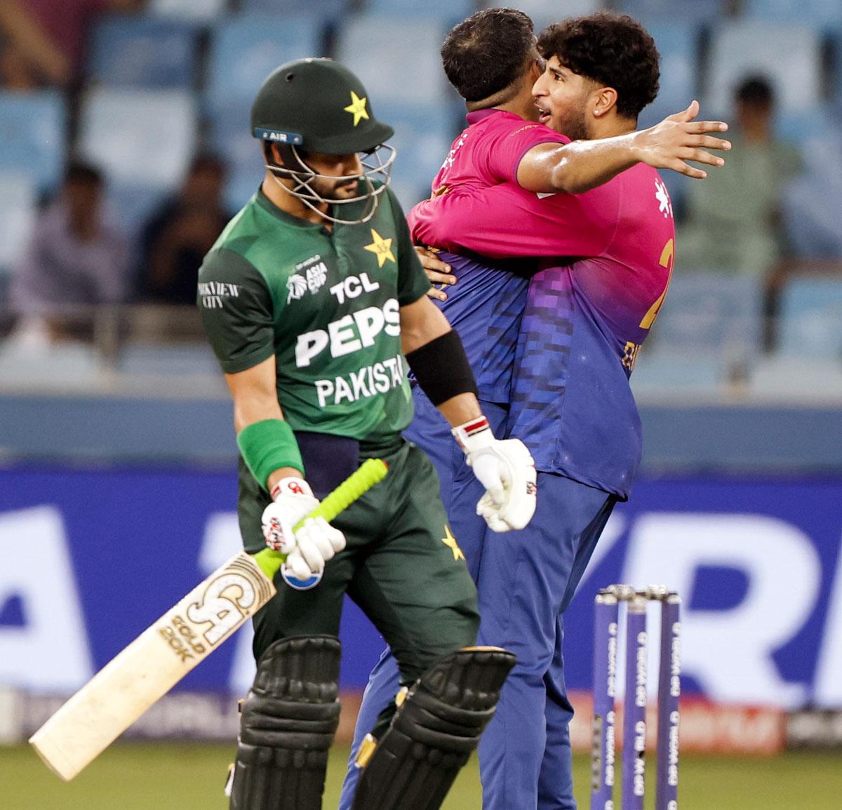 UAE's Junaid Siddique celebrates UAE's Junaid Siddique celebrates