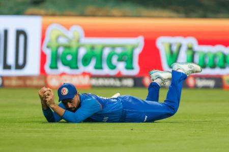 Afghanistan captain Rashid Khan takes a catch to dismiss Sri Lanka's captain Charith Asalanka during their Asia Cup 2025 match, at Sheikh Zayed Stadium in Abu Dhabi on Thursday