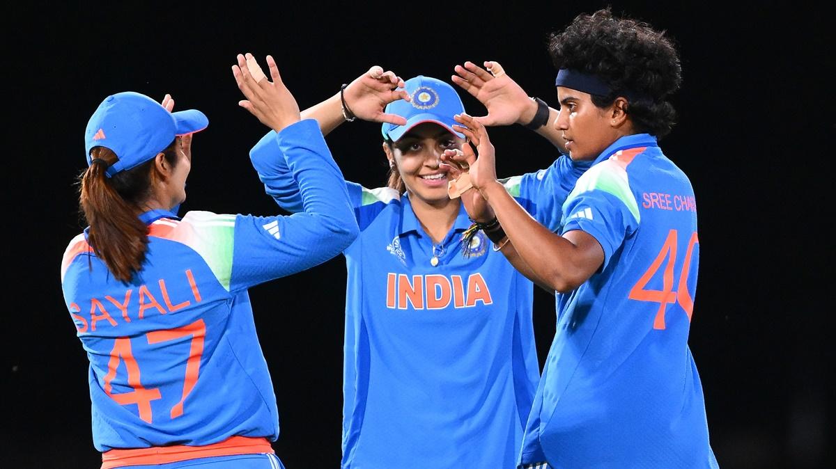 Left-arm spinner Sree Charani celebrates taking a wicket against New Zealand