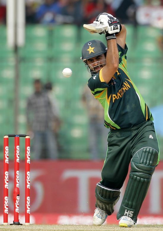 PHOTOS: Akmal ton takes Pak past Afghans with bonus point - Rediff Cricket