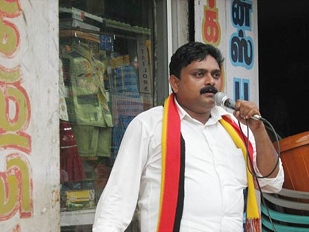 A DMK worker canvasses for his candidate in Kanyakumari